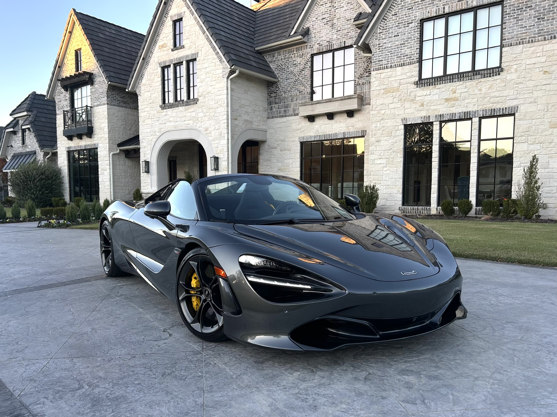 Supercar freshly detailed on a luxury driveway